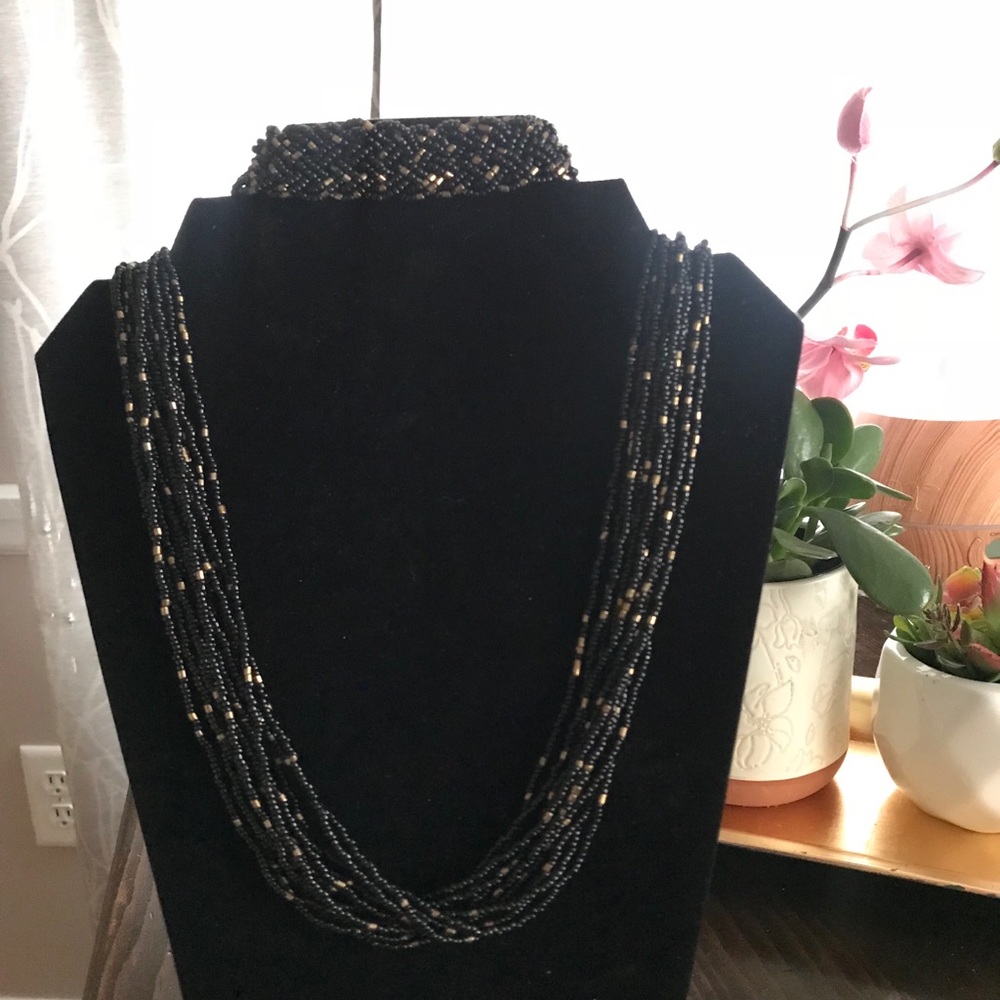 Black and gold beaded necklace and bracelet